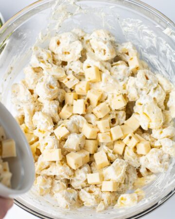 Ranch Tortellini pasta salad with Monterey jack cheese in a glass 