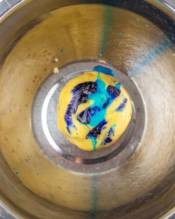 A cookie mixture with food coloring to make a bomb pop cookie.