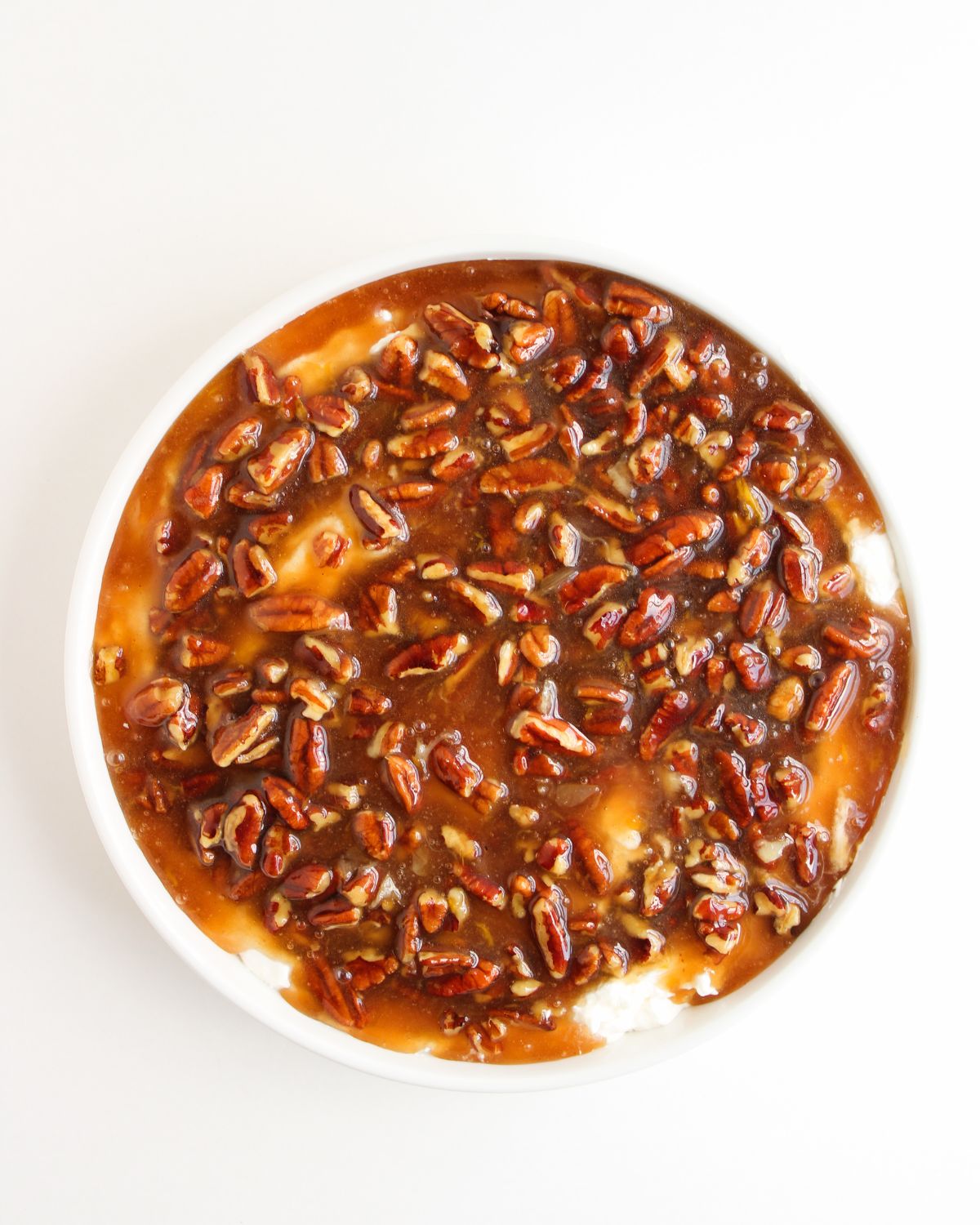 pecan pie dip topped with a caramelized pecan topping.