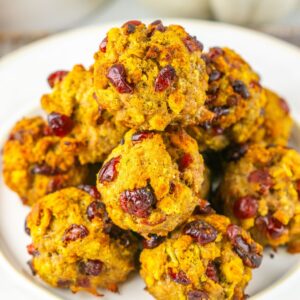 A stack of cranberry turkey stuffing balls on a plate.
