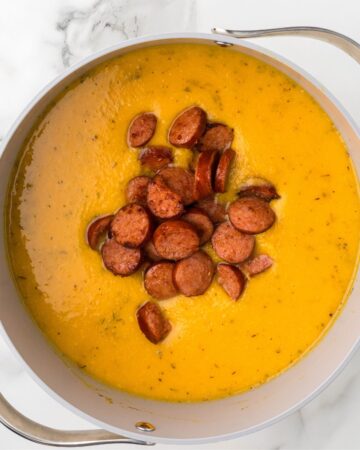 Andouille sausage and Italian Seasoning added to a cauliflower sweet potato soup.