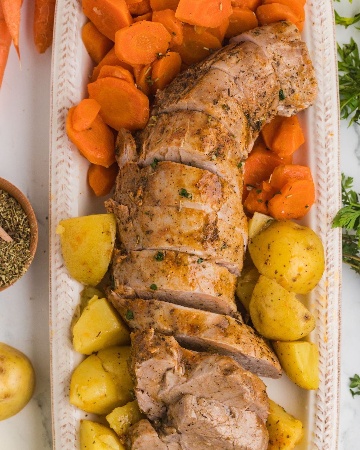 Instant Pot Pork Tenderloin with potatoes and carrots.