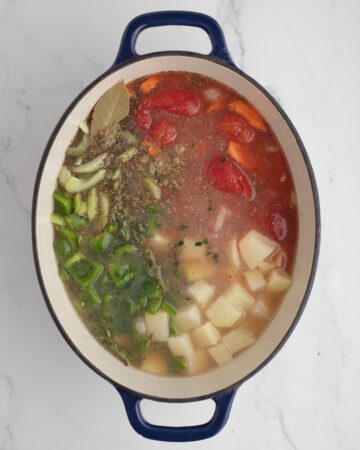 Ingredients to make easy Manhattan clam chowder with clam juice and vegetables.