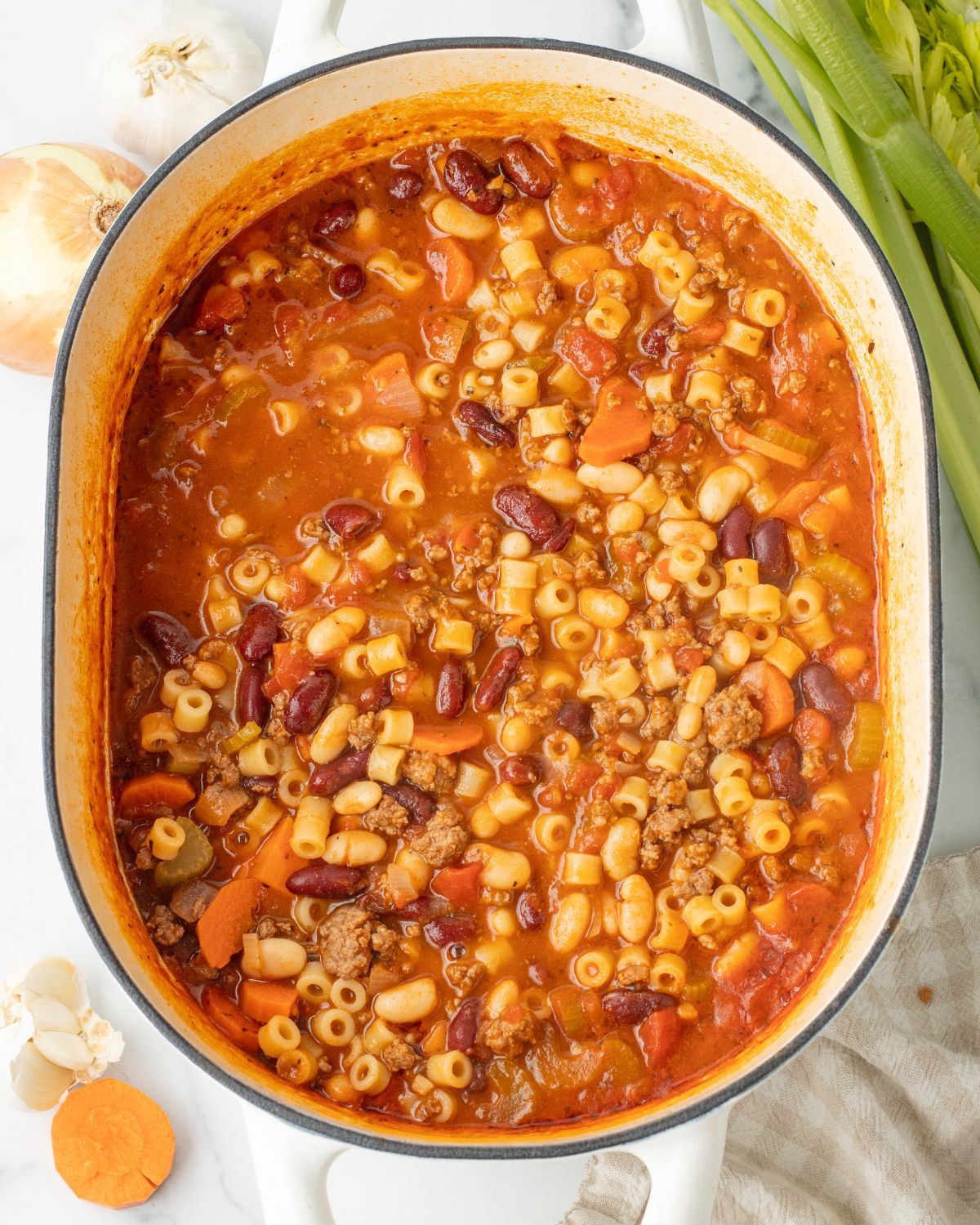 Homemade pasta e fagioli soup in a dutch oven.