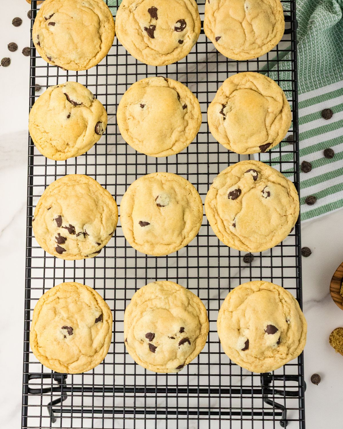 Cookie dough baked on to a wire cooling rack to make chocolate chip cookies no eggs.