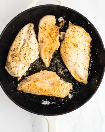 Marinated Greek chicken being saut&eacute;ed to make Greek chicken salad. 