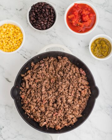 Ground beef Browned with other ingredients ready to add for burrito bowls.